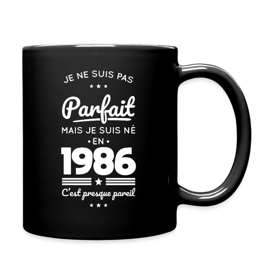 Mug uni anniversaire homme 40 ans – Pas parfait mais né en 1986 - noir